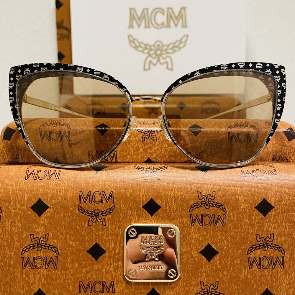 MCM Brand Sunglasses Style 144S Style in color 734
